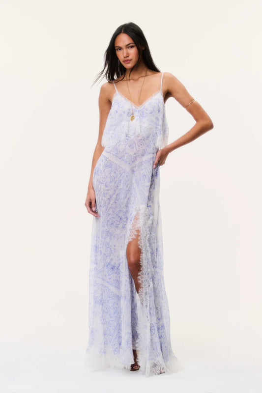 Woman wearing Love Shack Fancy Stelline Sheer Silk Maxi Dress